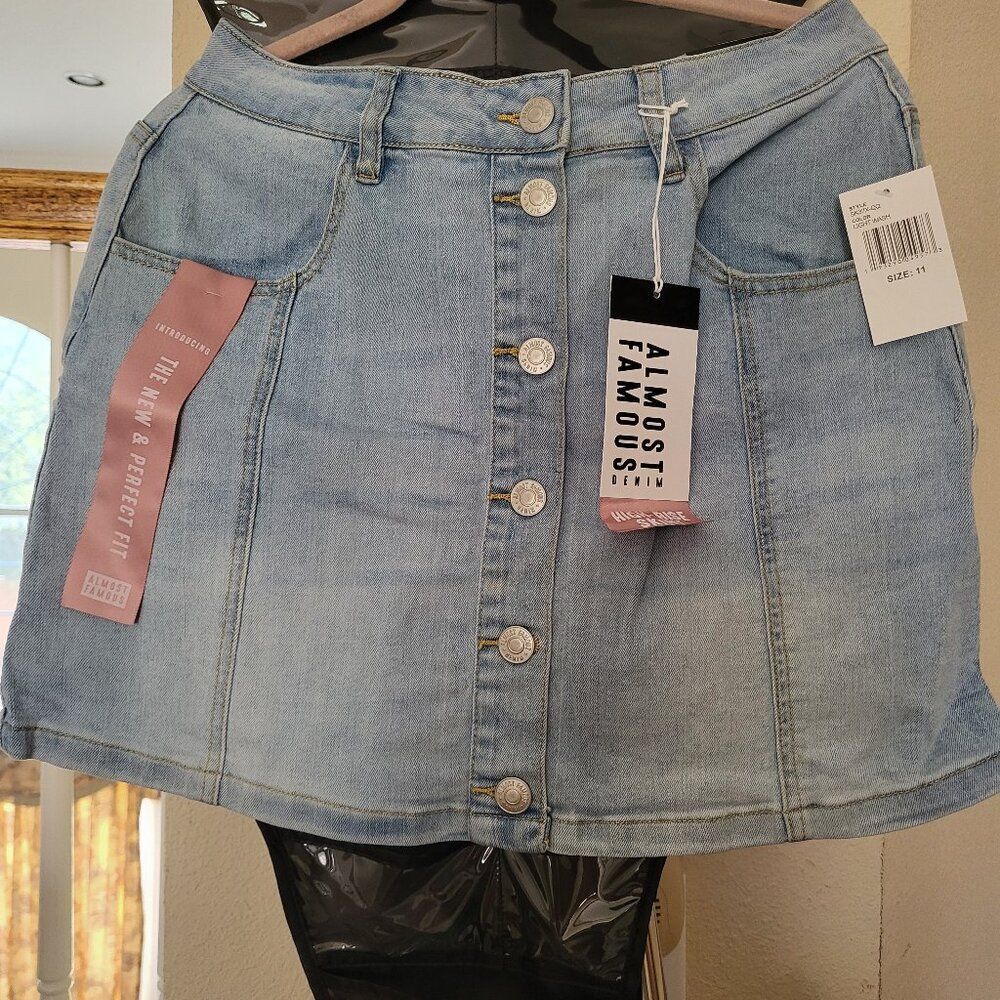The Almost Famous Jean Skirt  offers a variety of trendy denim skirts SIZE M